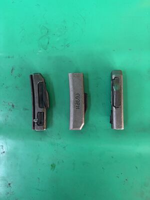 Pin V69PN do fechamento do adaptador dos acessórios dos dentes da cubeta das peças sobresselentes da máquina escavadora